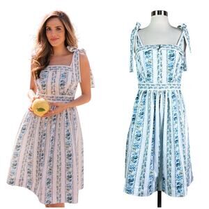 Gal Meets Glam | Arina White Blue Floral Cotton Tie Strap Fit Flare Summer Dress